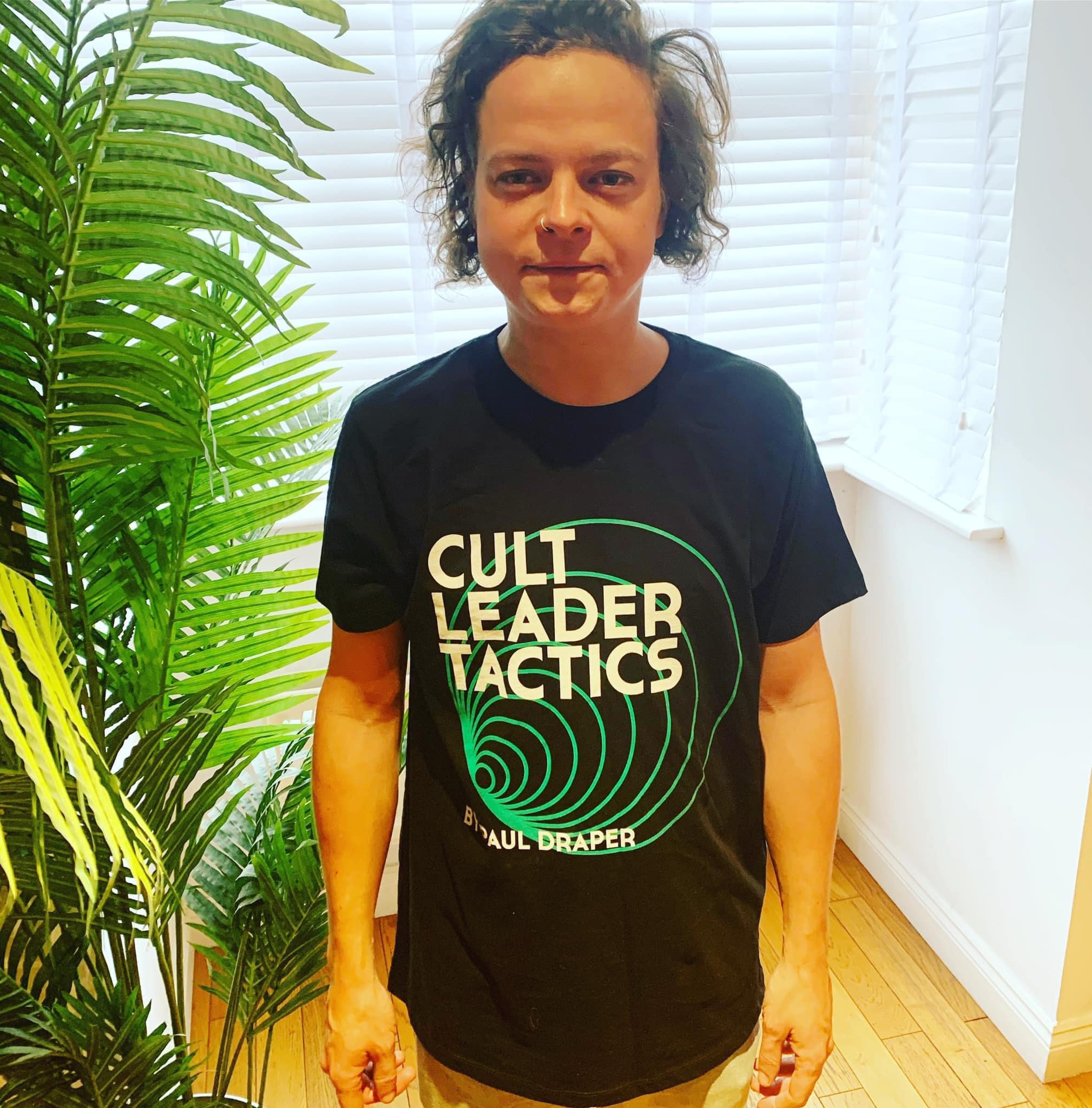 Featured image for “GRAB YOUR CULT LEADER TACTICTS T-SHIRT AS MODELLED BY ‘THE STILLEST MAN IN ROCK’!”